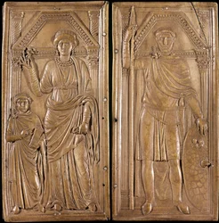 Stilicon (Flavius Stilicho vagy Stiliccho, 360-408), az ókori Róma barbár származású tábornoka és politikusa (vandál apa és római anya). „” Stilicon diptichonja””: Stilicon pisztoly és felesége Serena és fia, Eucherio. Elefántcsont 400 körül. Tresor of the