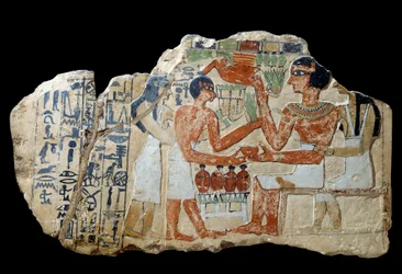 Egyiptomi ókor: Iri sztélé mészkőben. Egy pár felajánlást tesz. Első köztes időszak (Kr. e. 2200-2033) V. 0,3x0,52 m Párizs, Louvre Múzeum