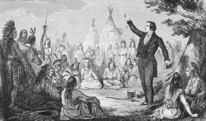 Joseph Smith, a mormon egyház alapítója indiánoknak prédikál, a „La Vuelta al Mundo” című műből, Madridban kiadva, 1865 (metszet)