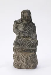 Buddhista pap kis szobra