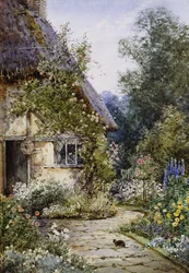Víkendház kert macskával az előtérben; és nyáron egy Cottage Border