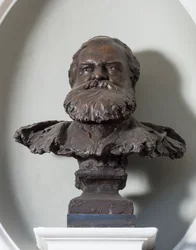 John Brett mellszobra, 1890 körül (bronz)
