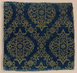 Lampas with foliate medallions in ogival lattice, 1400s. 