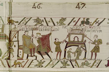 Hírek arról, hogy Haroldot elhozzák Williamhez, és a normannok felgyújtanak egy házat, Bayeux gobelin (gyapjú hímzés vászonon)
