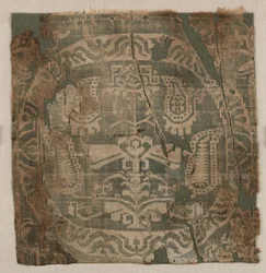 Kerek, szögletes palmettafával, tunikából, 650-850.