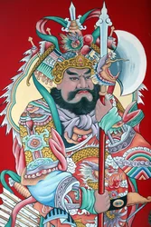 Hoi Tuong Te Nguoi Hoa buddista kínai templom. Őrző figura festmények a kapun. Phu Quoc. Vietnam.