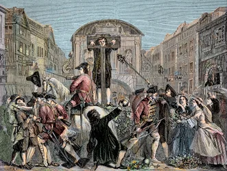 Daniel Defoe (De Foe) (1659-1731) 1703-ban Londonban pillantott, amiért kiadta „A legrövidebb út a másként gondolkodókkal” című ironikus traktátusát” – Daniel Defoe (1659-1731) írót és kalandort 1703-ban pellengérre ítélték. forgatókönyveiért az int