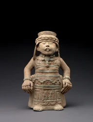 Álló női figura, 600-900 (terrakotta pigmenttel)