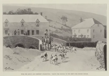 A Devon és Somerset Staghoundsokkal, elviszi a kopókat a Meetbe az Exford Bridge-en keresztül